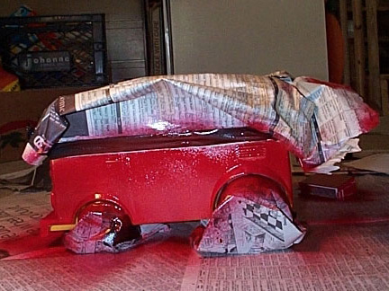 Red Paint Newspaper Cover